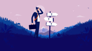 A businessman stands at a crossroads of three signs that all have question marks.